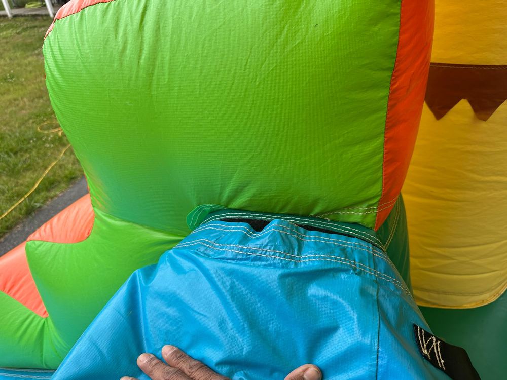 After photo of the seam resewn and closed at the velcro panel on a combo bounce house, completed by Stitches For Bounces