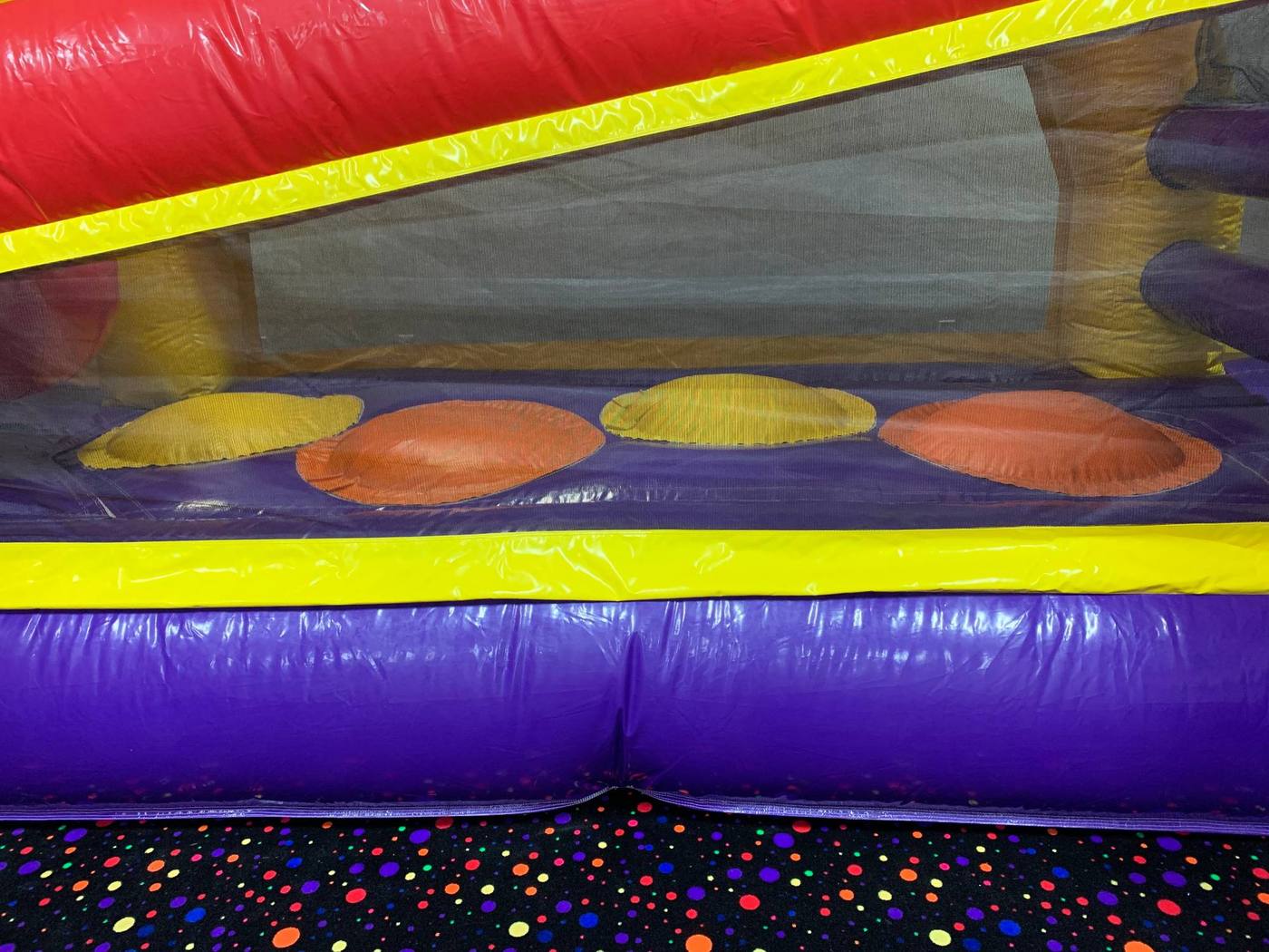 Real example of custom-built specialty inflatable cover by Stitches For Bounces