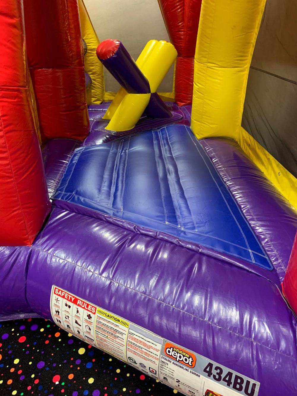 After photo of the inflatable pop-up obstacle repaired and back in place, completed by Stitches For Bounces