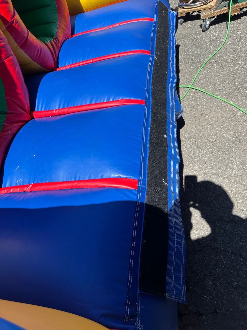 After photo of the entrance seam resewn and closed on the obstacle course, completed by Stitches For Bounces