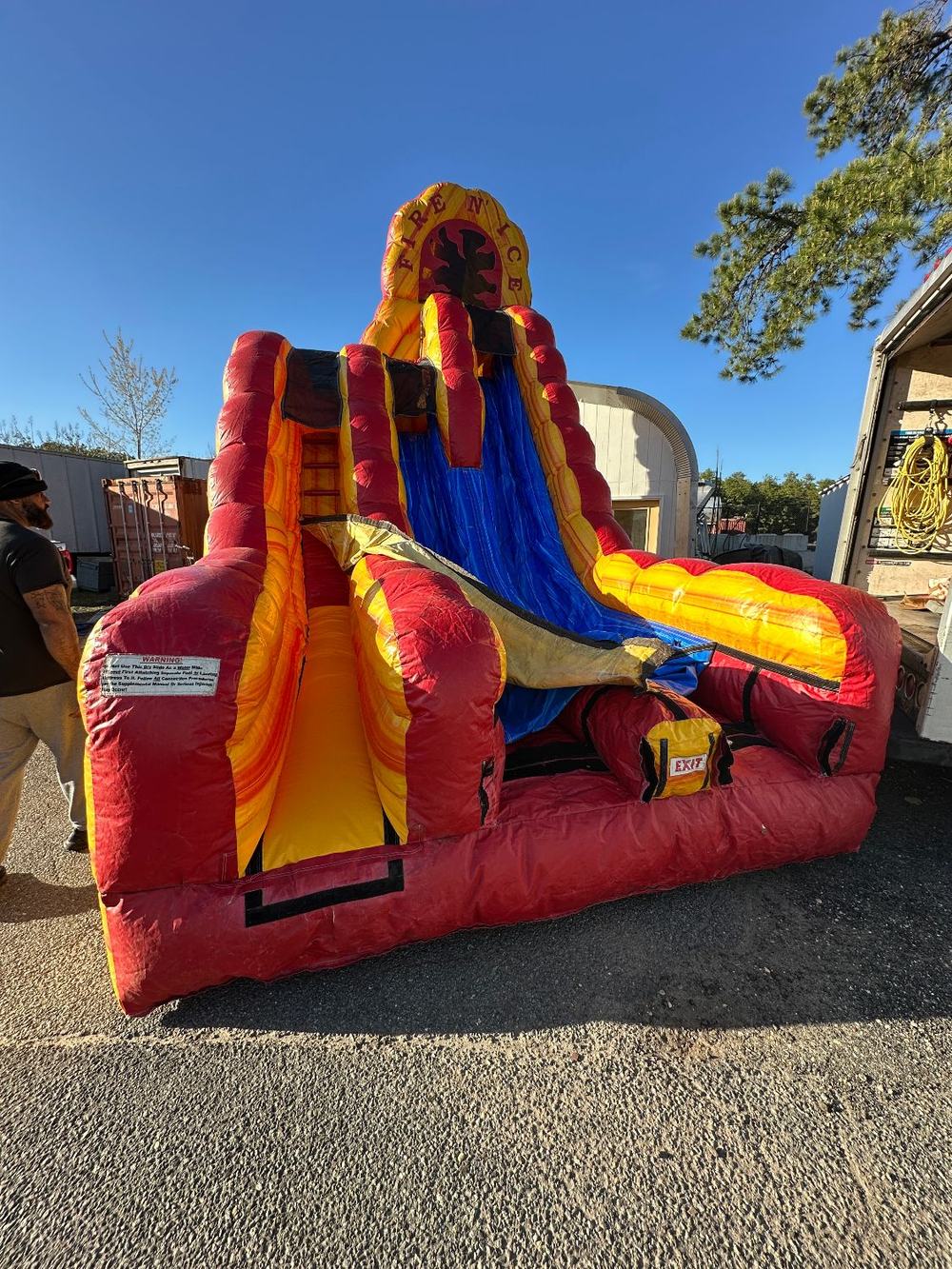 After photo of the fully assembled Fire N' Ice water slide with the seam repair complete, completed by Stitches For Bounces