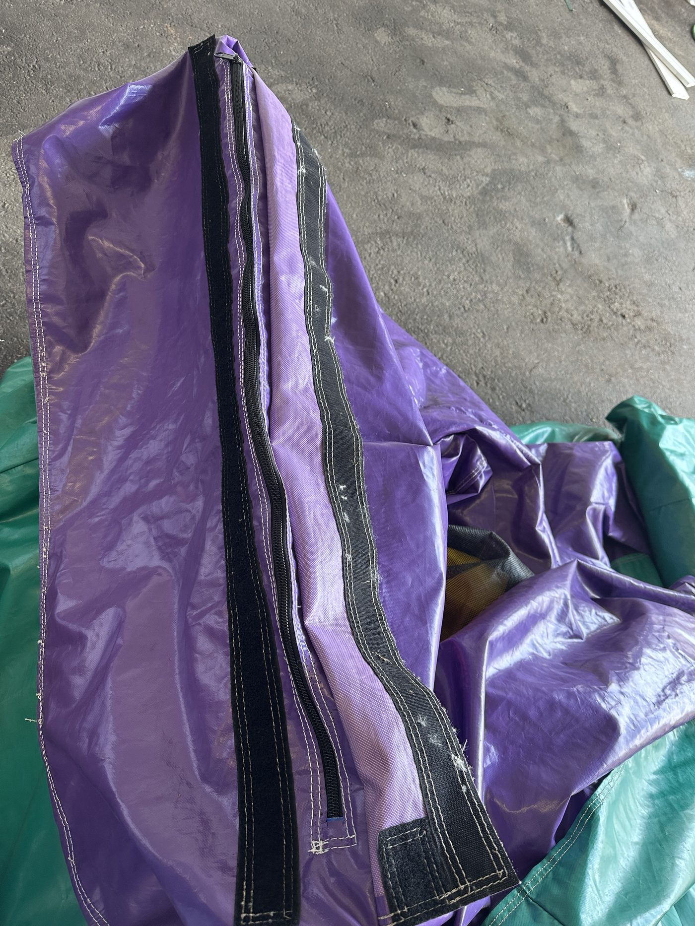 After photo of zipper replacement on a bounce house panel, completed by Stitches For Bounces